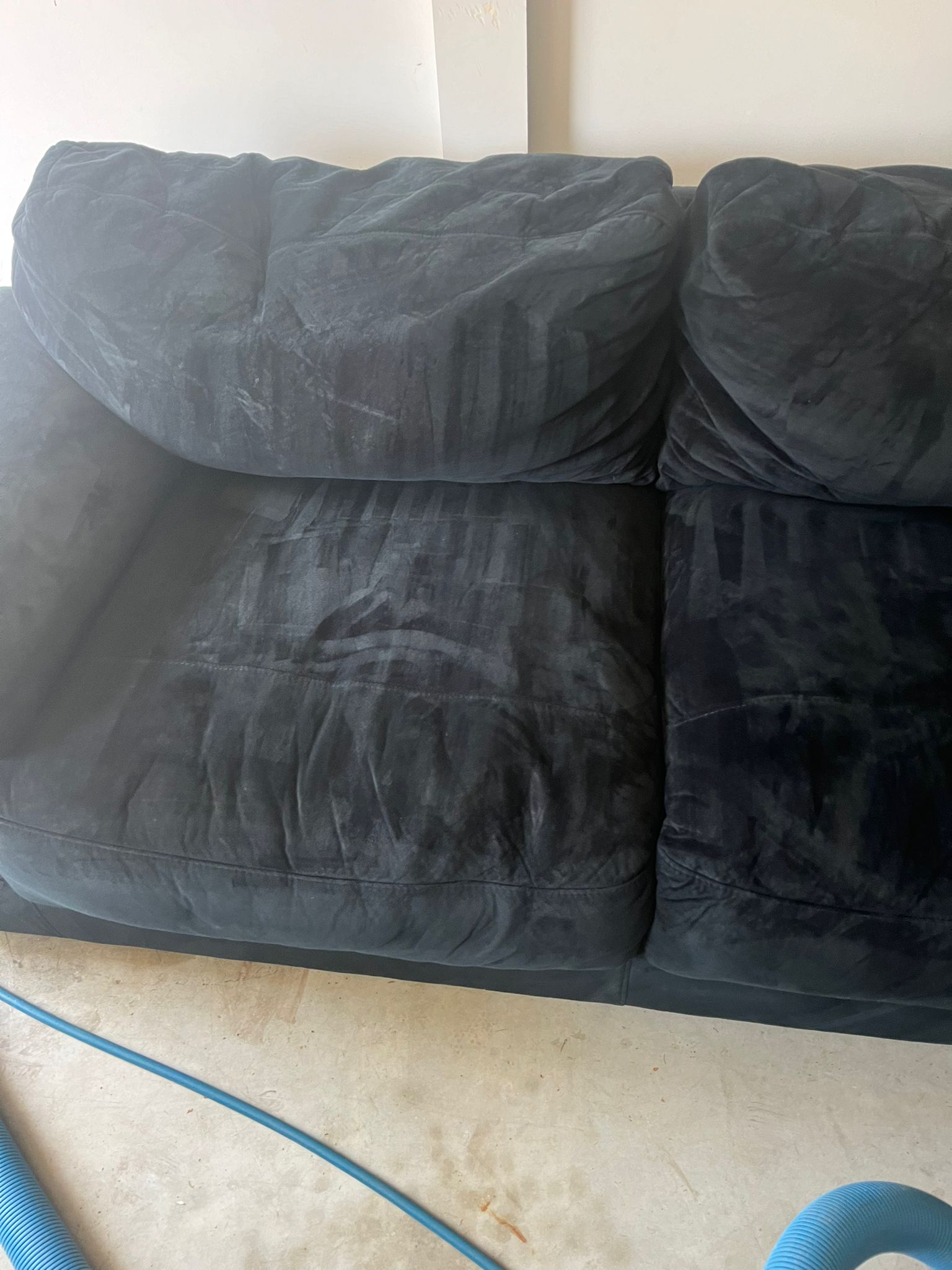 Dirty fabric sofa before professional upholstery cleaning