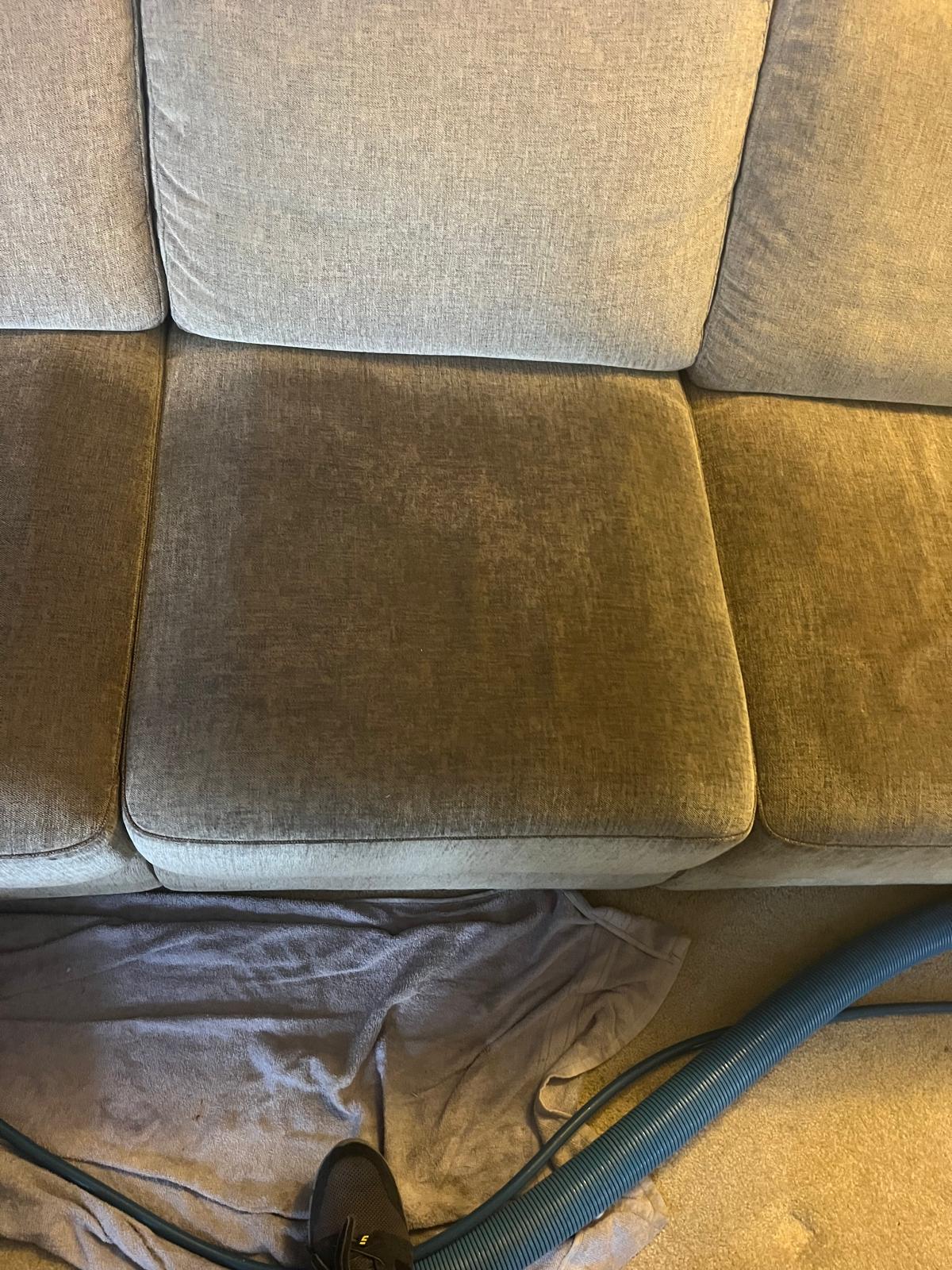 Sofa upholstery with heavy dirt before cleaning service
